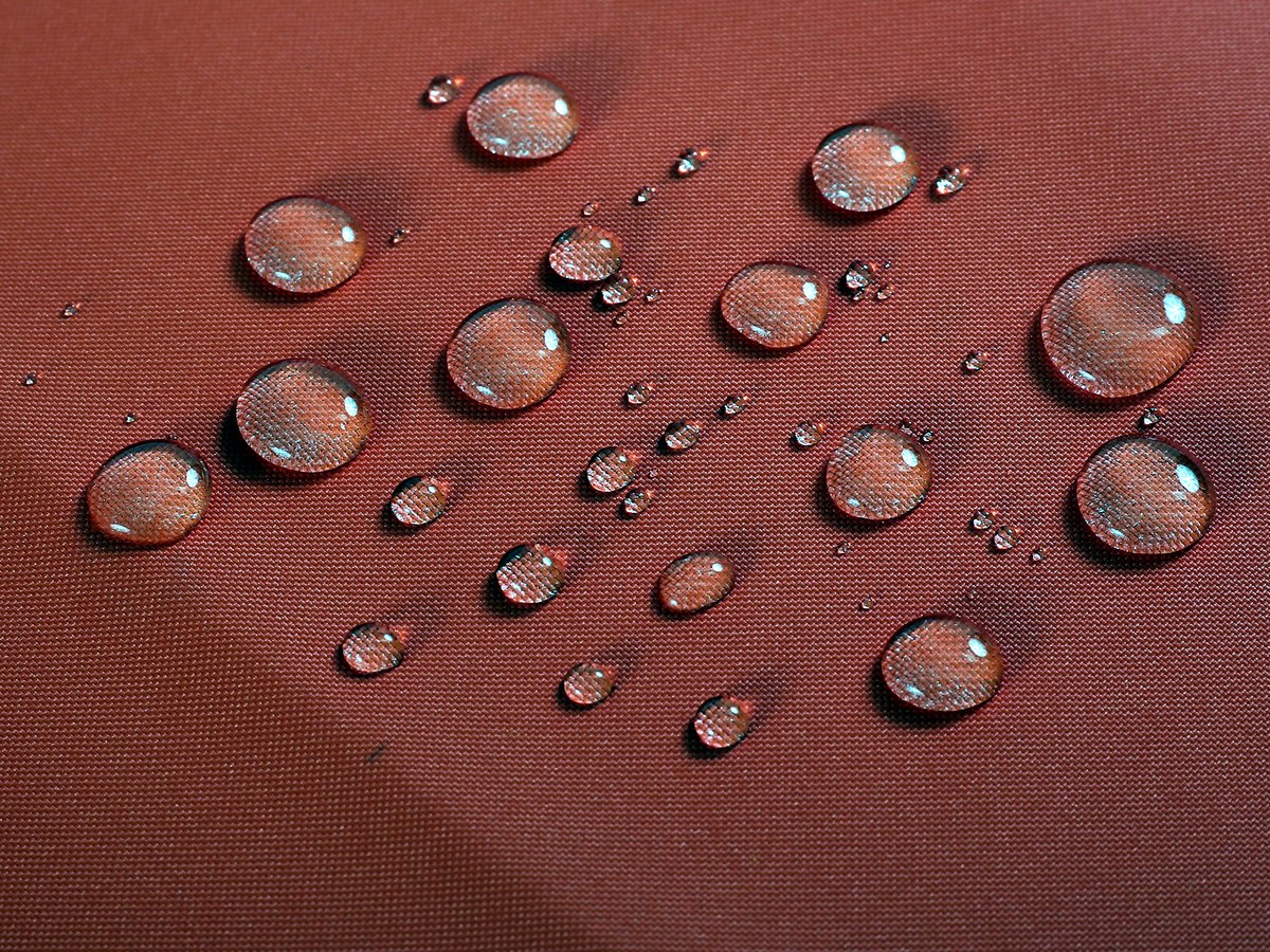 Water-resistant functional fabric detail for composite textile applications